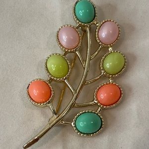 Vintage Leaf Brooch With Colored Faux Stones

By Sarah Coventry